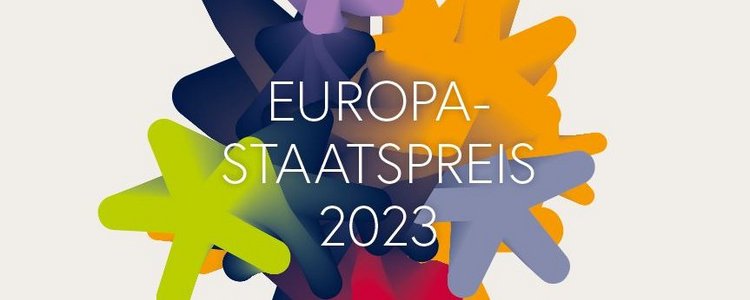 Bunte Sterne ineinader verlaufend vor grauem Hintergrund mit Aufschrift Europasstaatspreis 2023 im Vordergrund